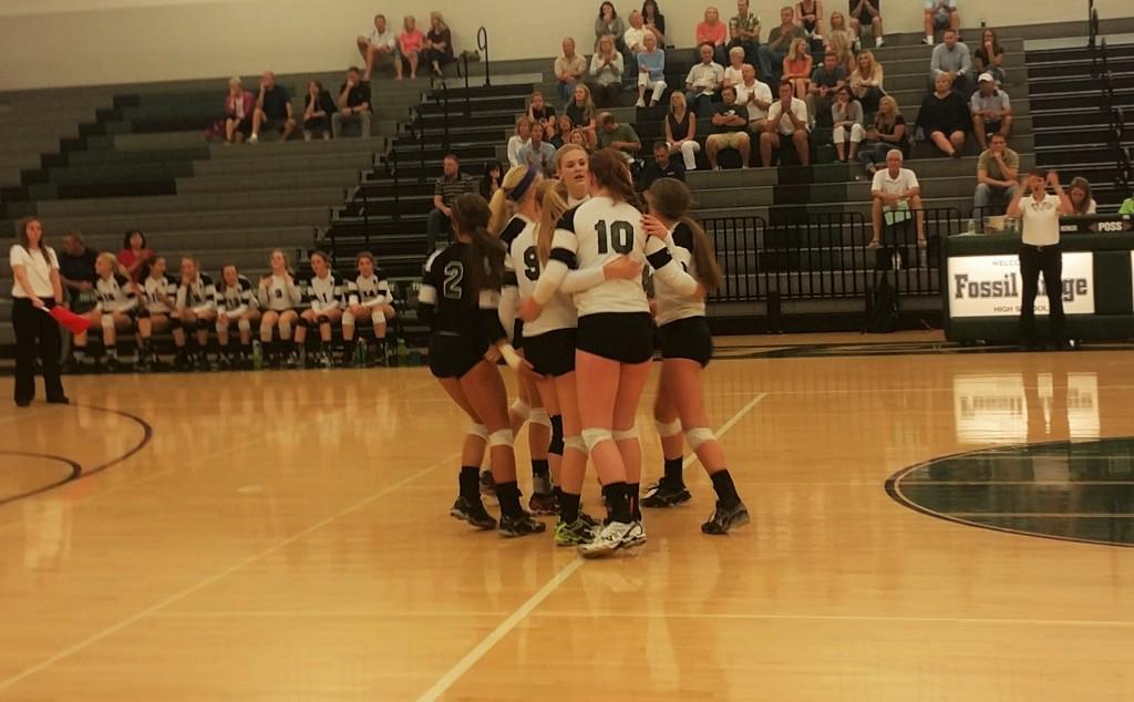 FRHS Volleball celebrates after receiving a point.