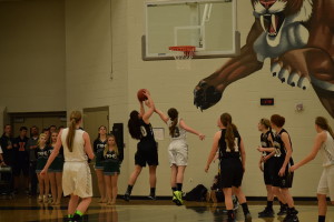 Wess attempts to tip the ball of a rebound. Photo provided by Haley Rockwell
