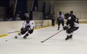 Bryan Lockner handling the puck on the rink alongside his Thunderbirds club team. Photo provided by Bryan Lockner 