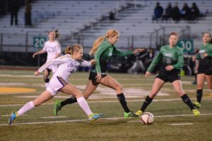 Koplyay dribbles by Claire Jenkins from Collins. Photo provided by Courtney Koplyay