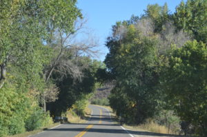 Driving along an empty road. Photo Credit: Katie Reed