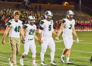Fossil Ridge varsity football captains. From left to right, Nick Edridge, Brandon Spraberry, Griffin Roberts, and Brady Russell. Photo provided by Griffin Roberts. 