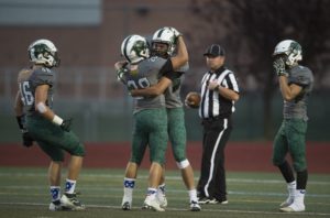 Fossil Ridge football celebrates touchdown play. Photo provided by Kevin Lytle 