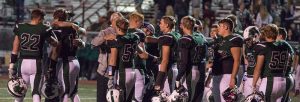 Fossil football team breaks down when Junior Kevyn Simpson is taken off the field. The loss knocks the Sabercats out of their playoff run. Photo provided by Dennis Johnston. 