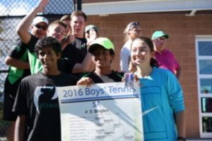 Sabercats huddle around Akhil after winning his bracket during state. Photo credit: Akhil Gupta  