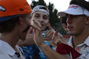 Dayton gets face painted by senior Jared Brannen. Photo credit: Katie Reed